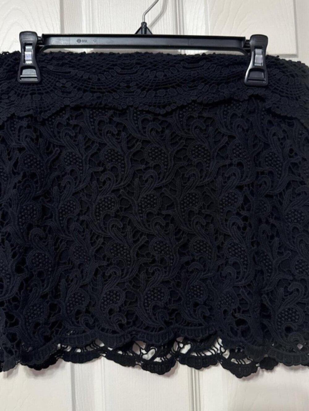 Black lace mini skirt